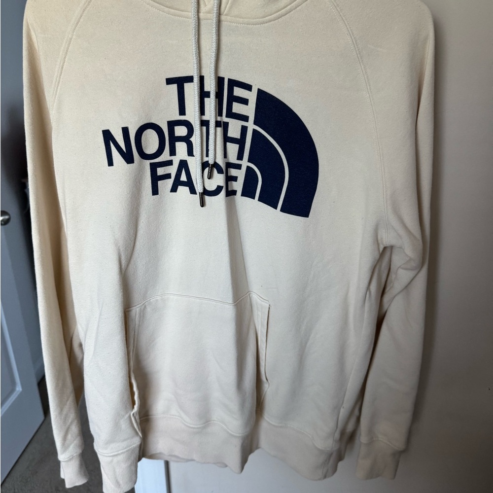 The North Face Cream and Blue Jacket with Iconic Logo